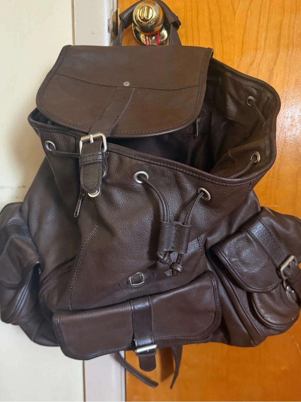 Dark Brown Leather Drawstring Backpack with Silver Hardware